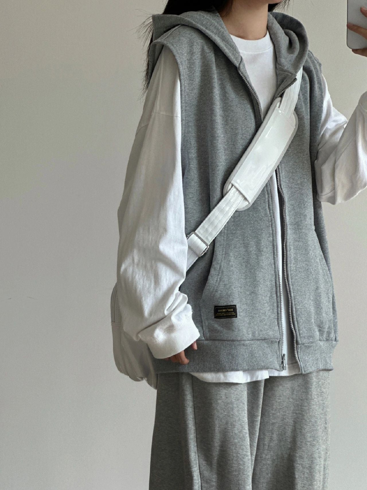 Grey sleeveless hooded zipper vest