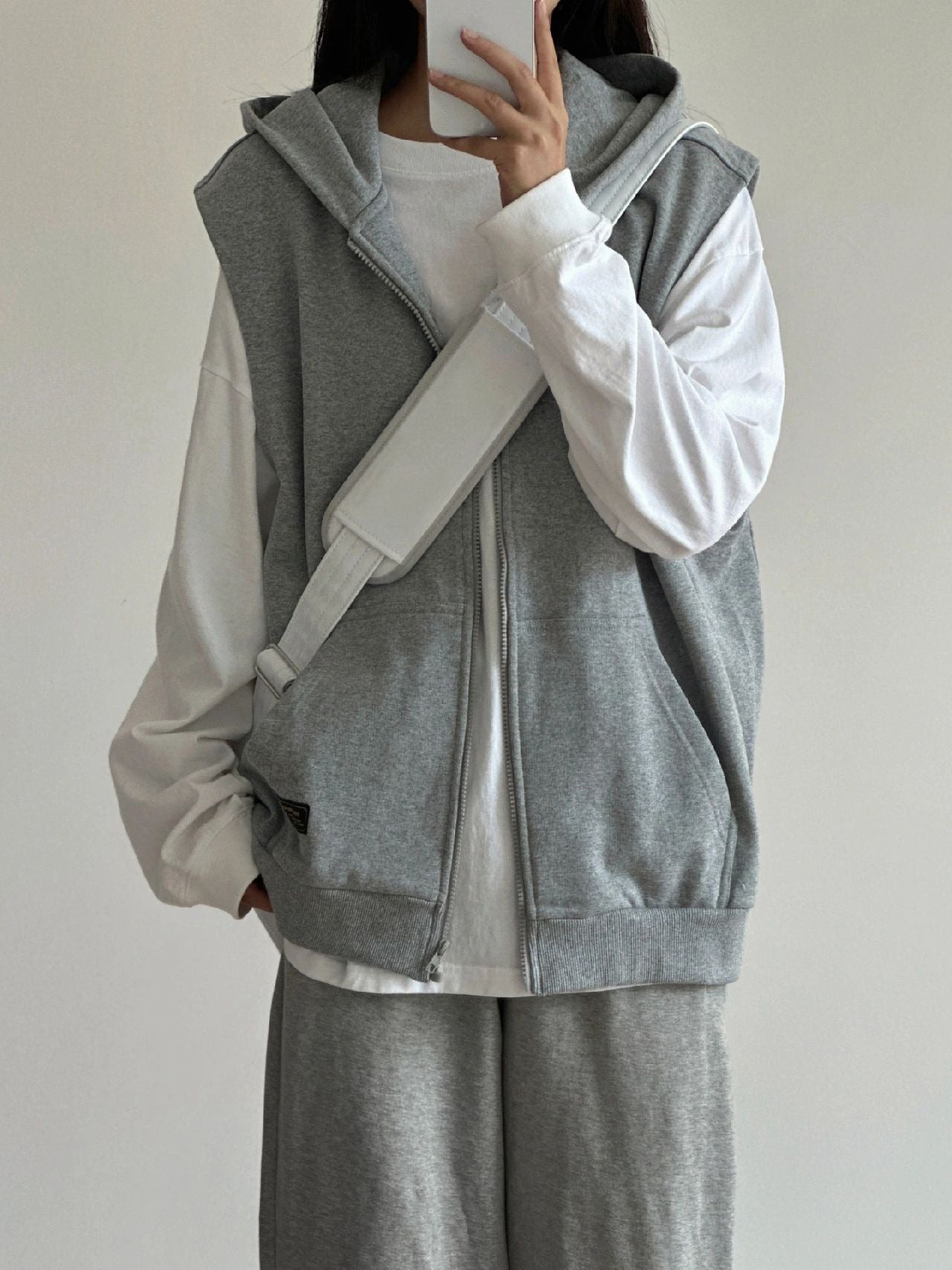 Grey sleeveless hooded zipper vest