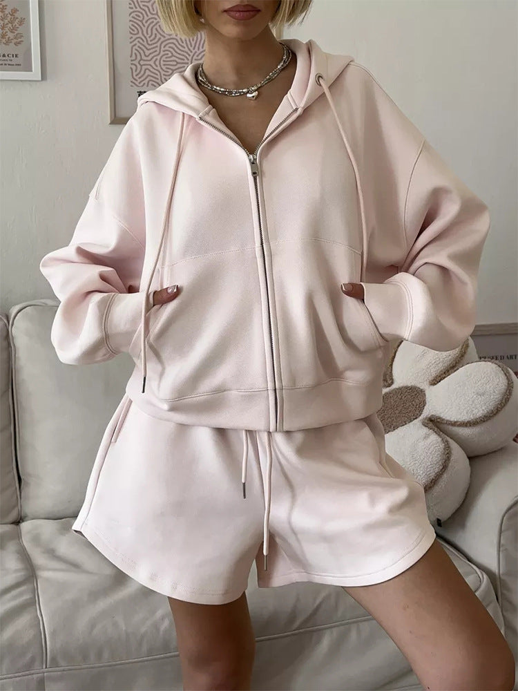 Two-piece hooded sweatshirt and shorts with large pockets